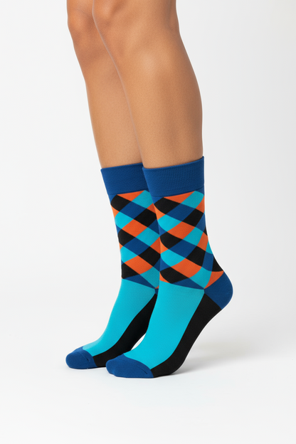 Argyle Inferno crew socks flat lay showing bold blue and orange diamond argyle pattern