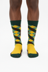 Checker Charm crew socks flat lay showing mustard yellow and forest green checker argyle pattern