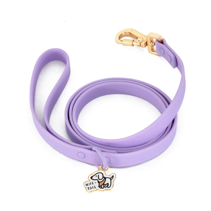Lavender PVC dog leash in use showing easy-clean material and durable clip hardware