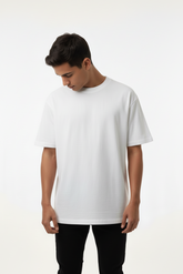 A person wearing a well-fitted, white  ModSoles 100% premium cotton t-shirt 
