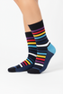 Pulse Stripe crew socks flat lay showing vivid color block stripe pattern in bold tones