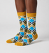Sandstone Mosaic crew socks flat lay showing warm desert-tone geometric mosaic pattern